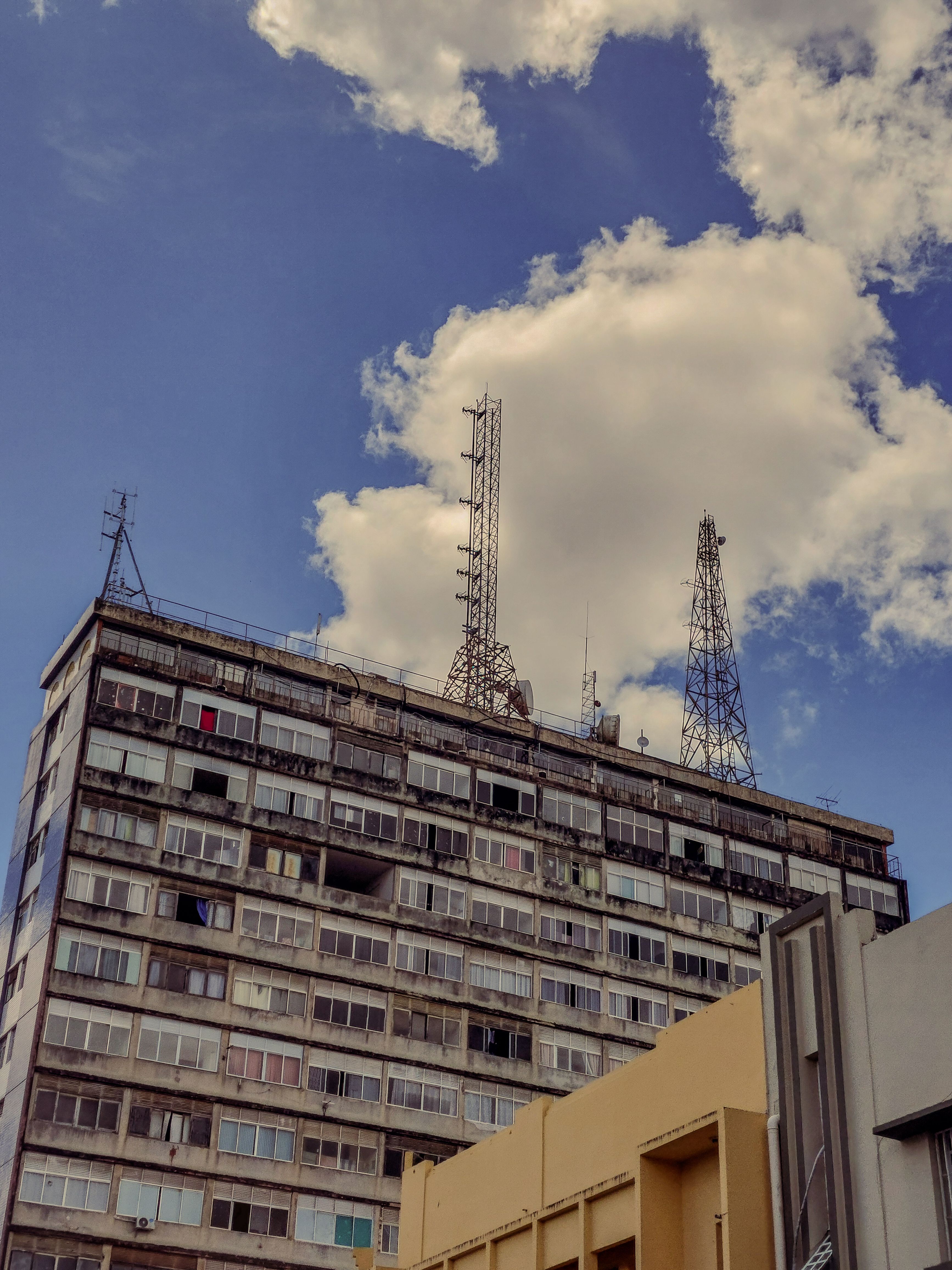 A Residential Building Against the Sky Background · Free Stock Photo