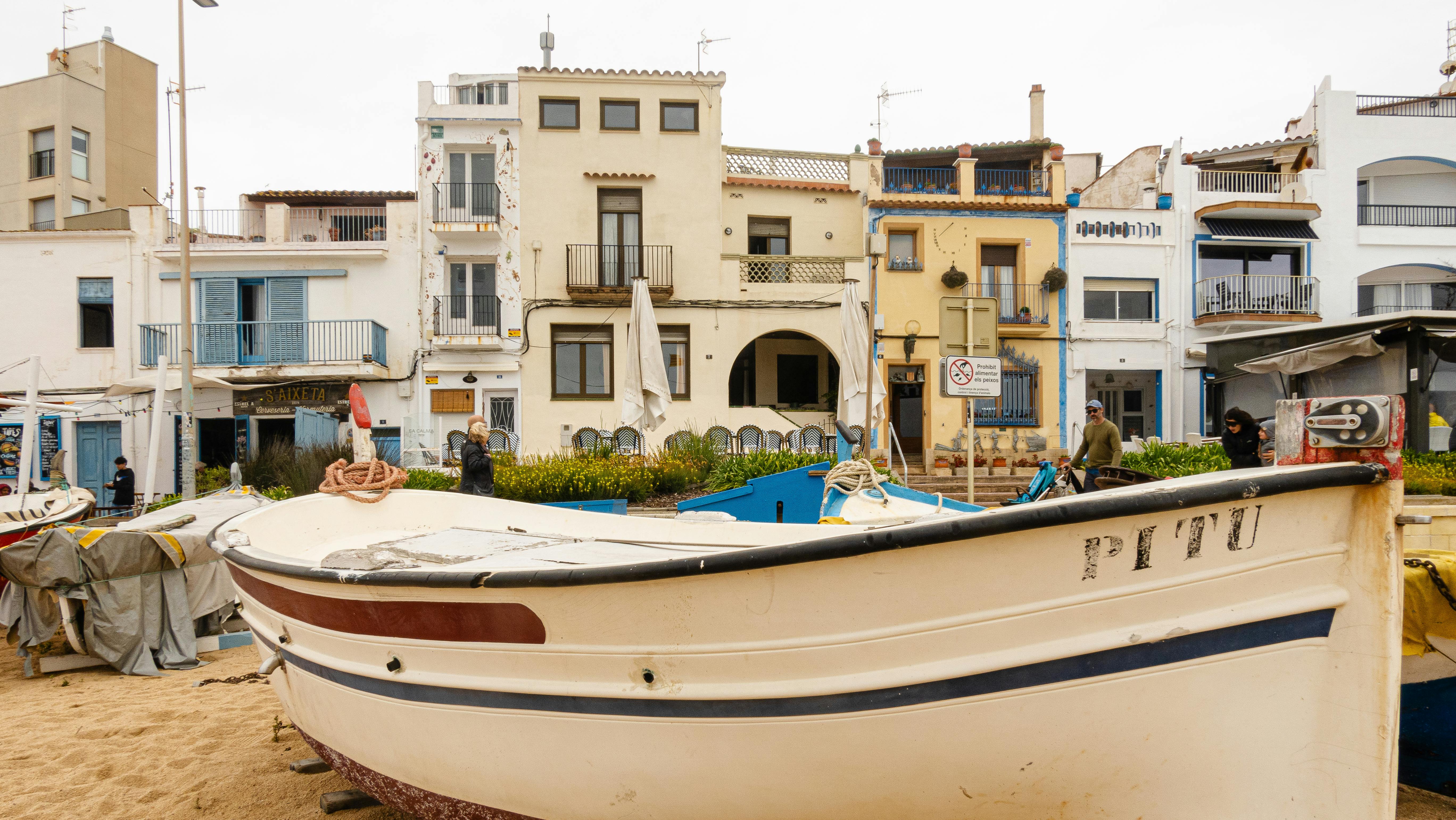 Boat on Beach in Coastal Town