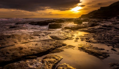 dalga, deniz, gün batımı içeren Ücretsiz stok fotoğraf
