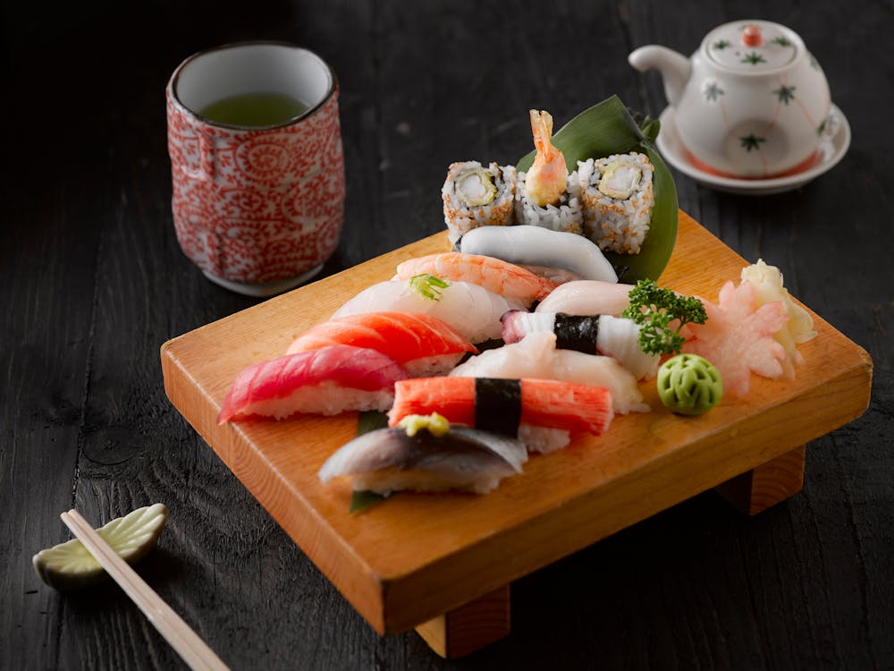 Free Sushi On Brown Wooden Board Stock Photo