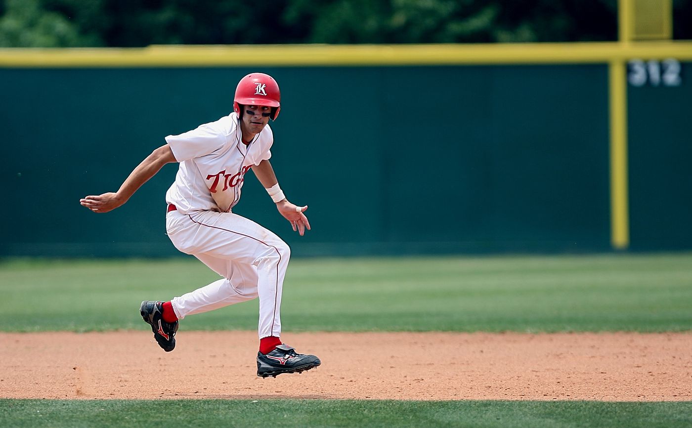 Base runner sprinting toward the next base