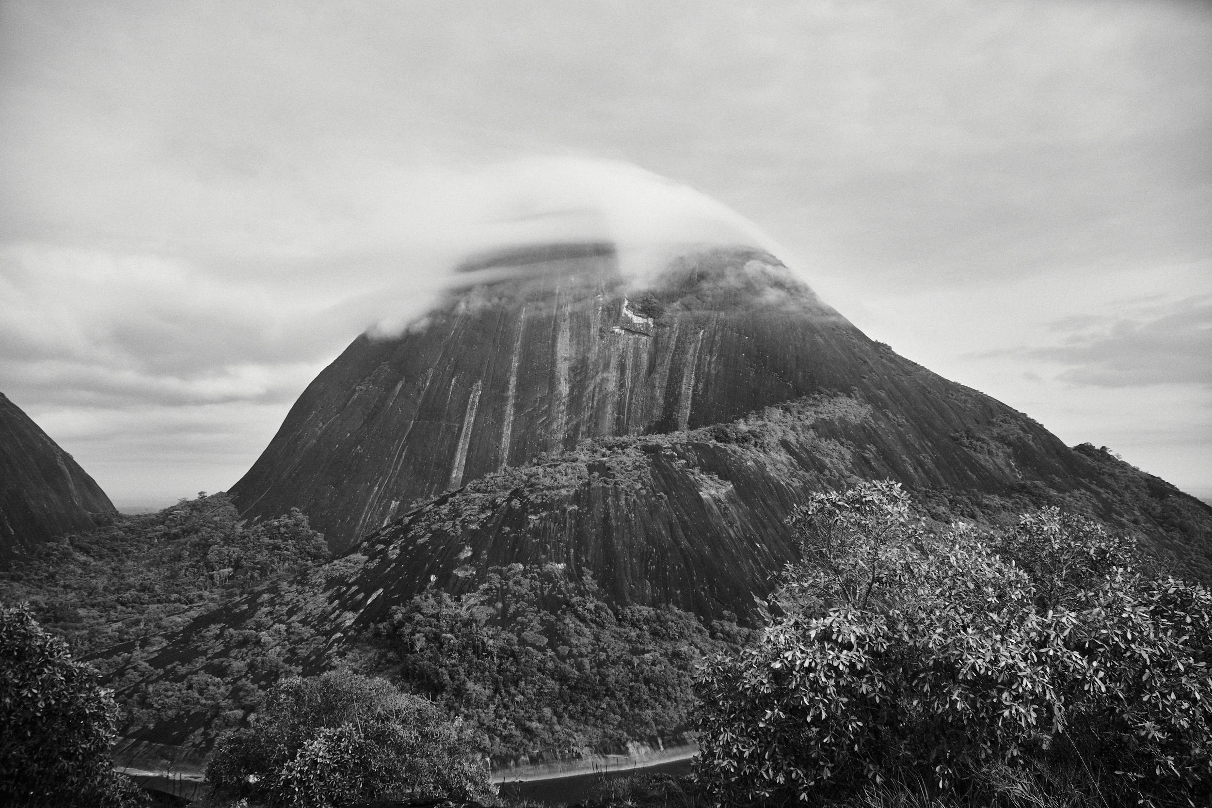 Black and white depiction of the Cerros de Mavecure mountains in Colombia, showcasing natural beauty.