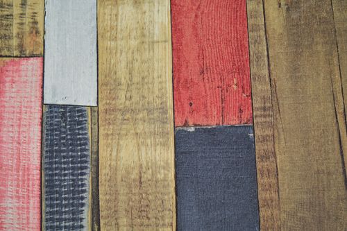 Free A vibrant arrangement of wooden planks in a rustic pattern, showcasing natural and painted textures. Stock Photo