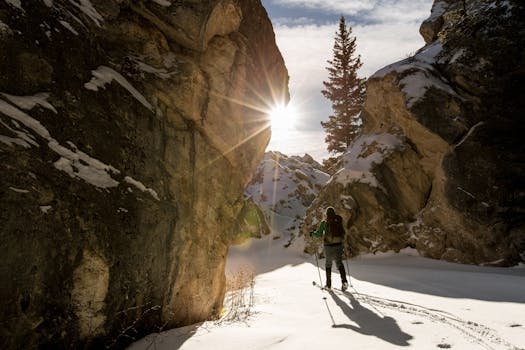 Man Hiking in Snowy Mountain