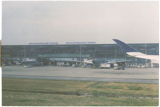 Airplanes on the tarmac at Noi Bai International Airport in Hanoi, Vietnam.