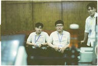 Three Young Students Posing Together