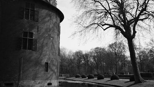 A black and white photo of a windmill