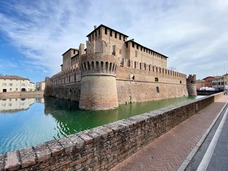 Historic Rocca Sanvitale castle surrounded by a moat in Fontanellato, Italy.