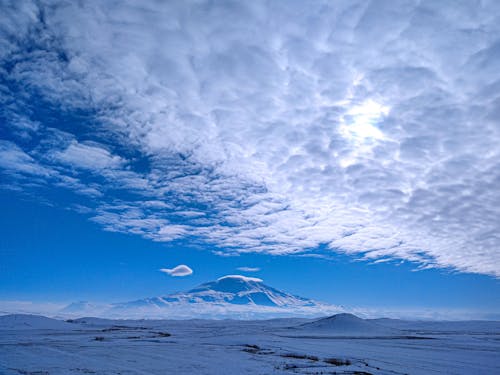 Cloud over Mountain and Countryside in Winter