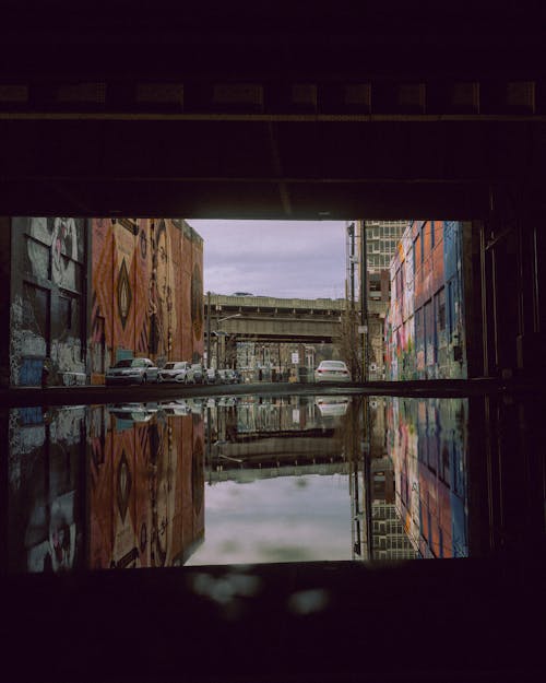 A view of a city street from inside a tunnel