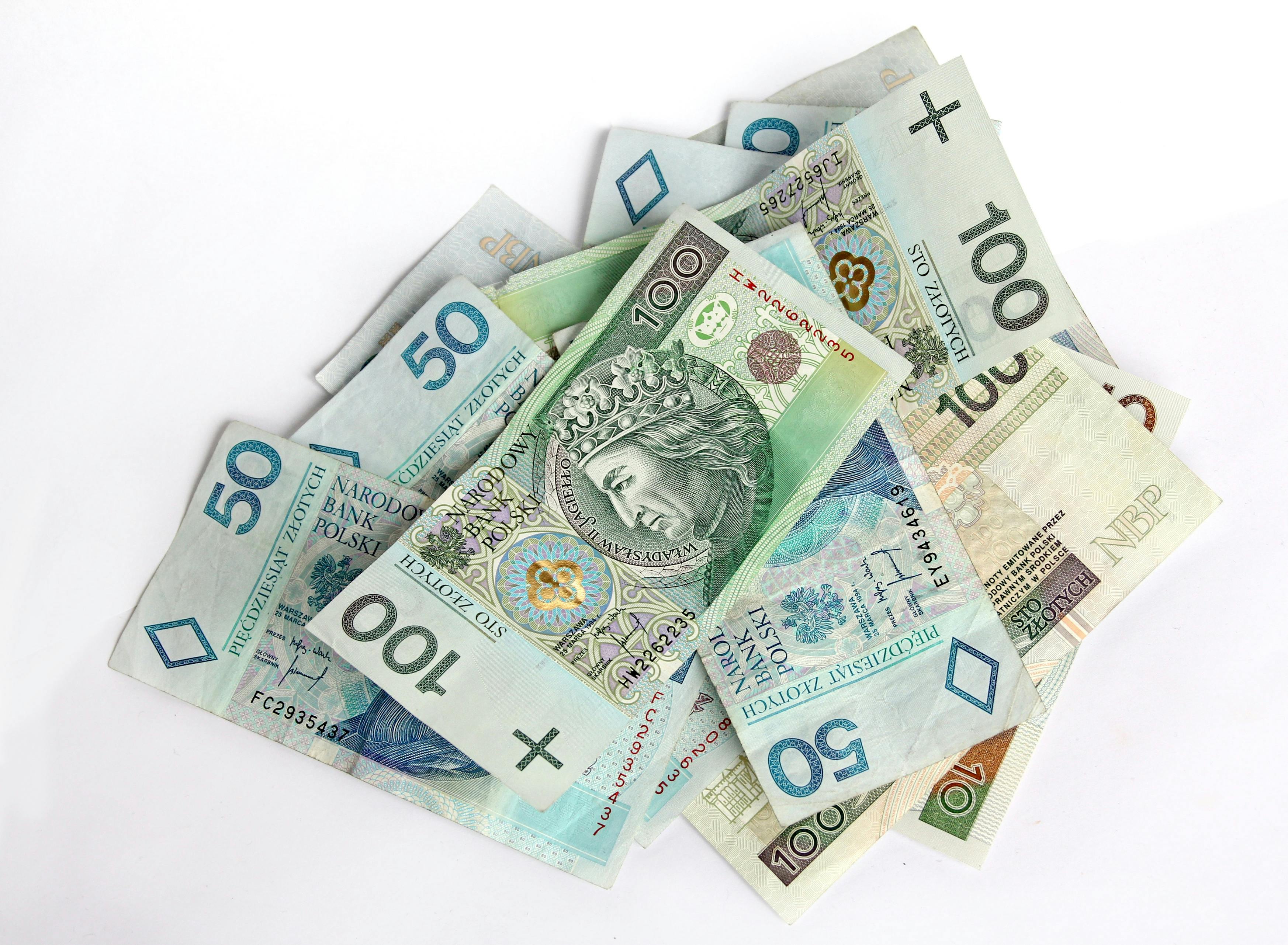 Banknotes on White Surface