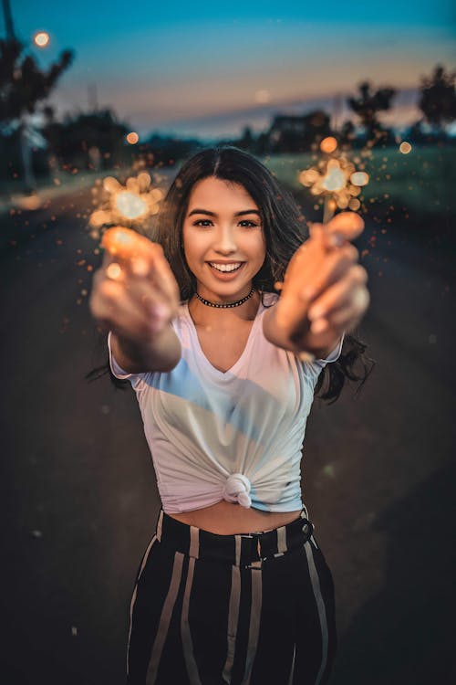 Woman Holding Sparklers