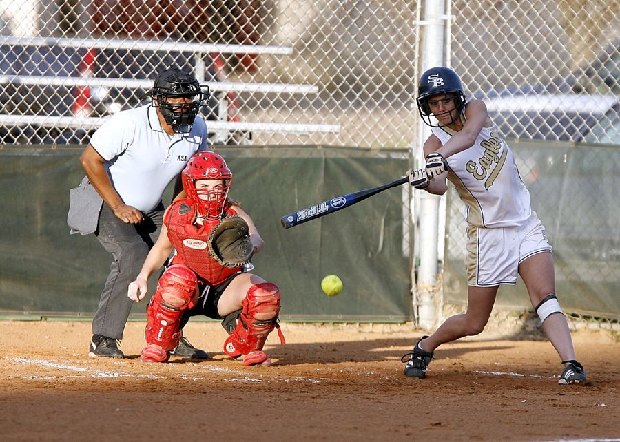Batter swinging at a pitch during a game