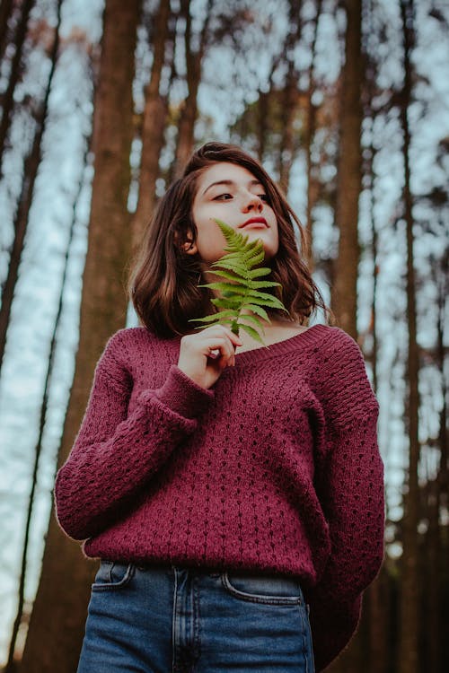 Woman Holding Leaf