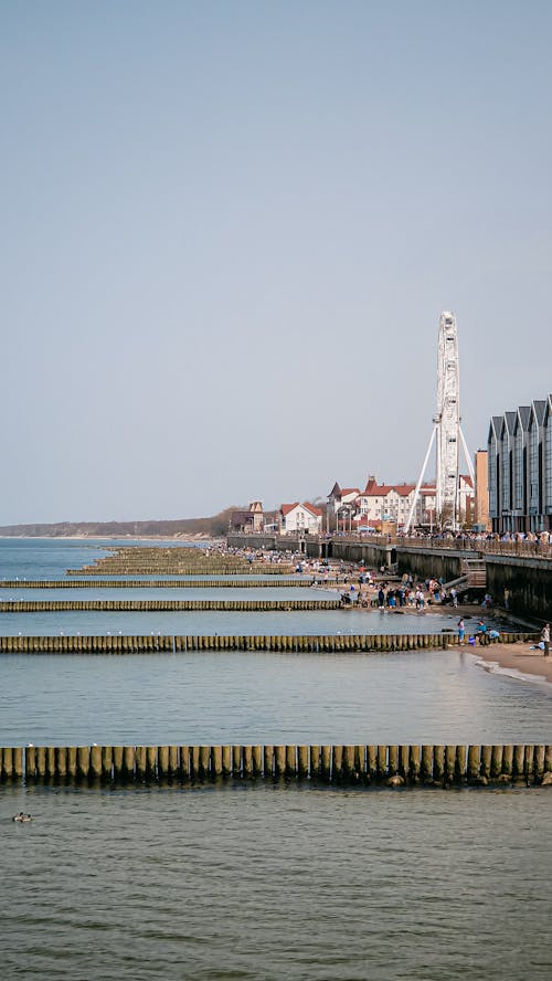 Ingyenes stockfotó függőleges lövés, kikötőgátakon, strand témában