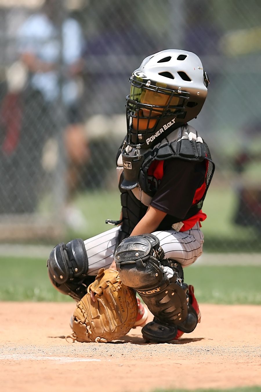 young catcher in protective gear