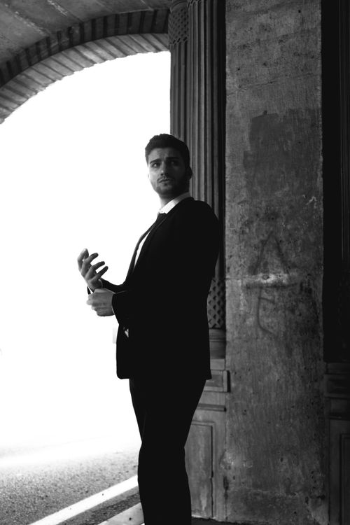 Free Stylish black and white portrait of an elegant man in İstanbul's urban setting. Stock Photo