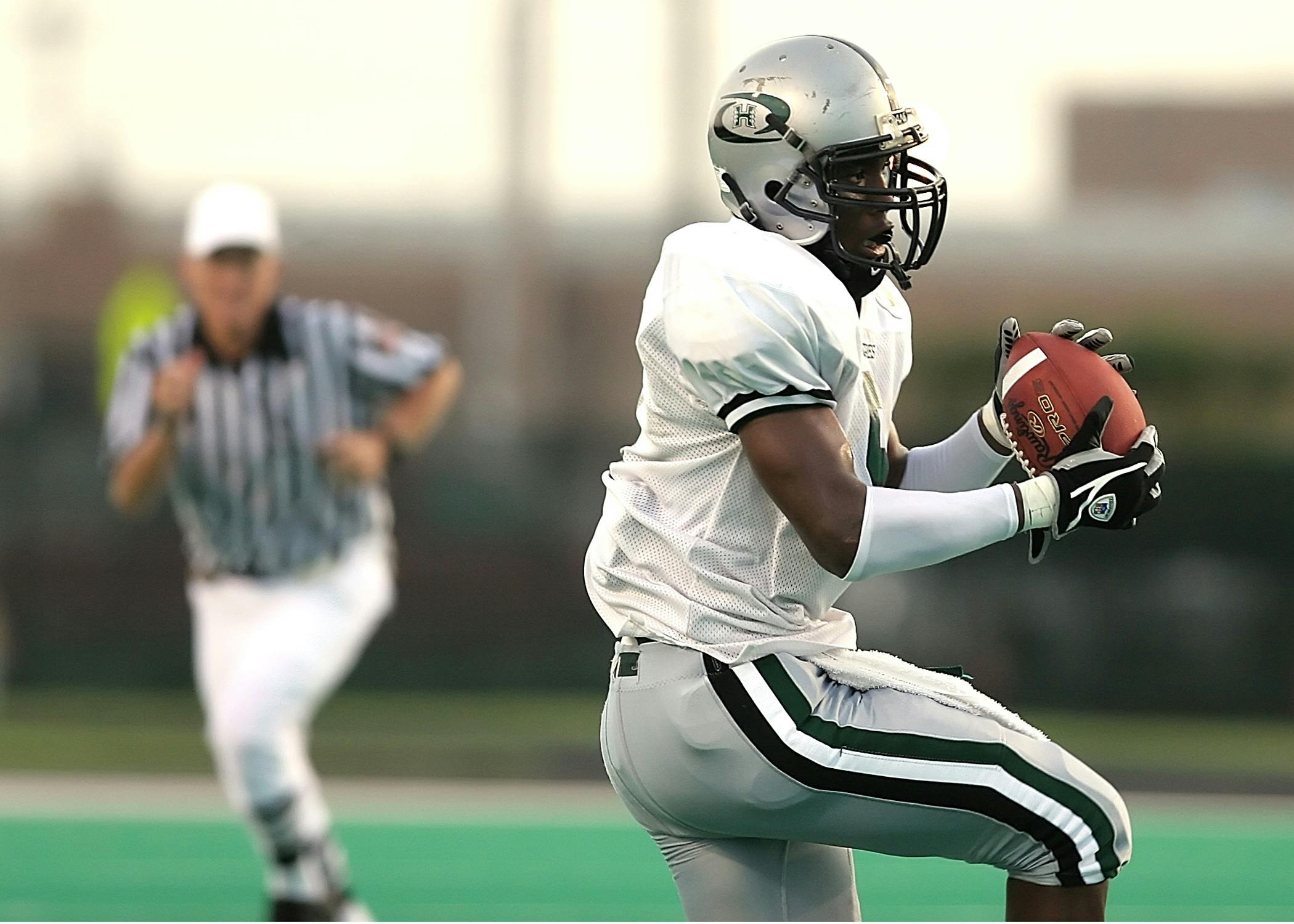 man playing football