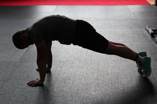 Black Squatting on Grey Floor