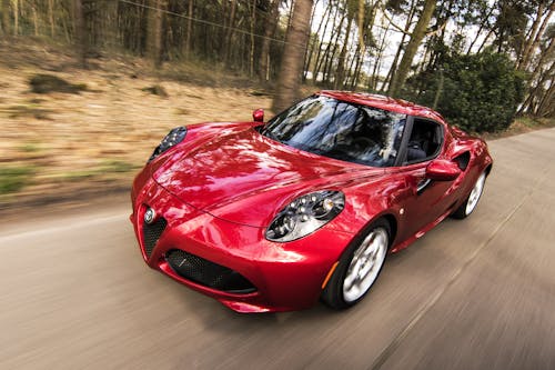 Free Red Alfa Romeo C4 on Road Near Trees Stock Photo