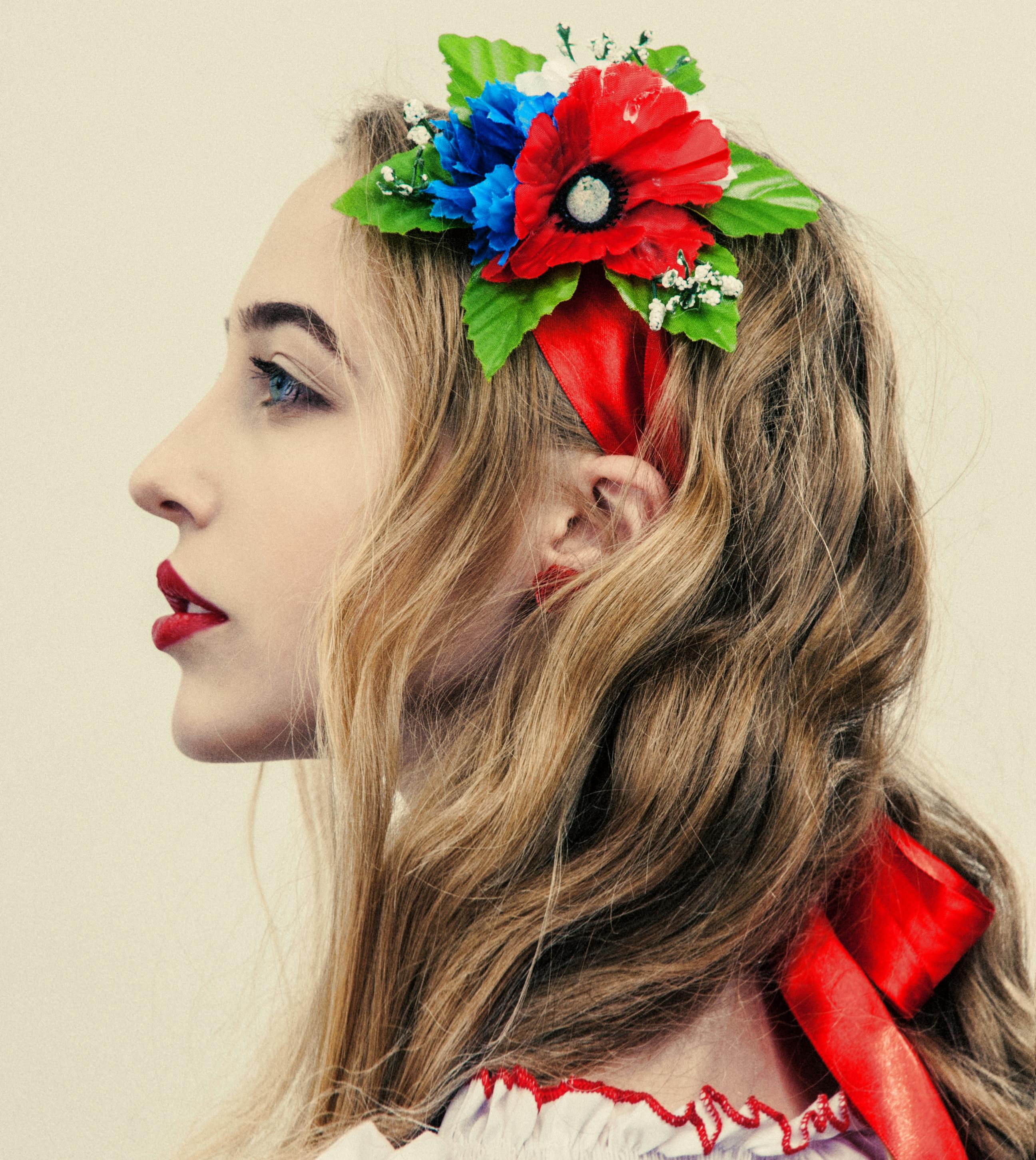 Woman Wearing Floral Headband Facing Sideways