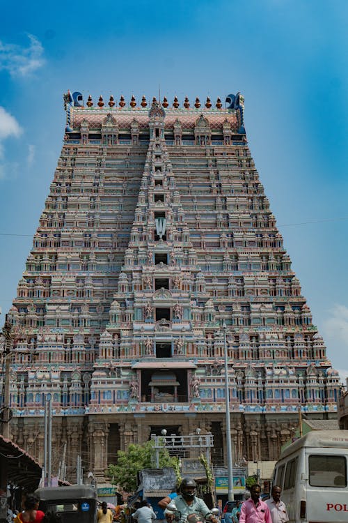 A tall building with many colorful designs on it