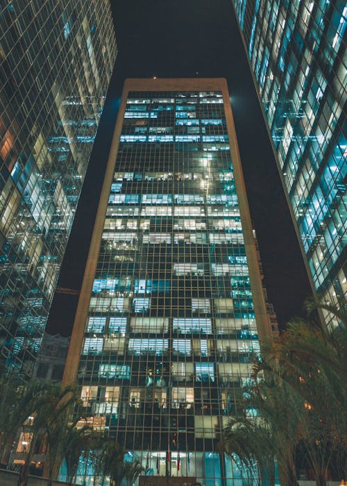 Free 3 Tall Buildings At Night Time Stock Photo