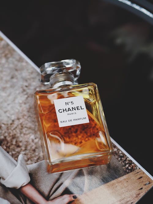 Chanel perfume bottle on a magazine