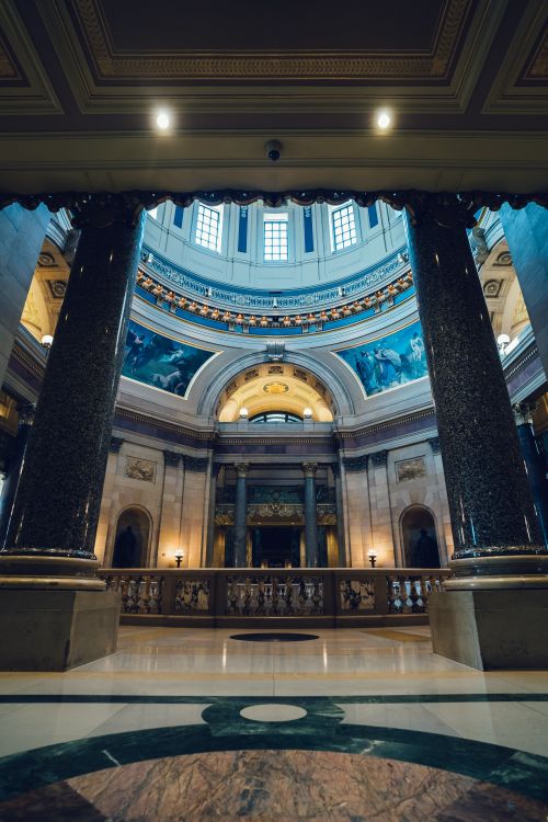 Free Stunning architectural interior with grand domed ceiling and ornate columns. Stock Photo