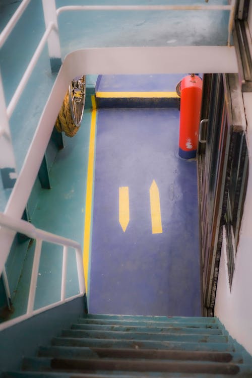 A stairway leading to the deck of a boat