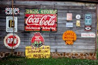 Drug Store Drink Coca Cola Signage on Gray Wooden Wall