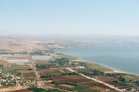 Aerial View of City Near Body of Water