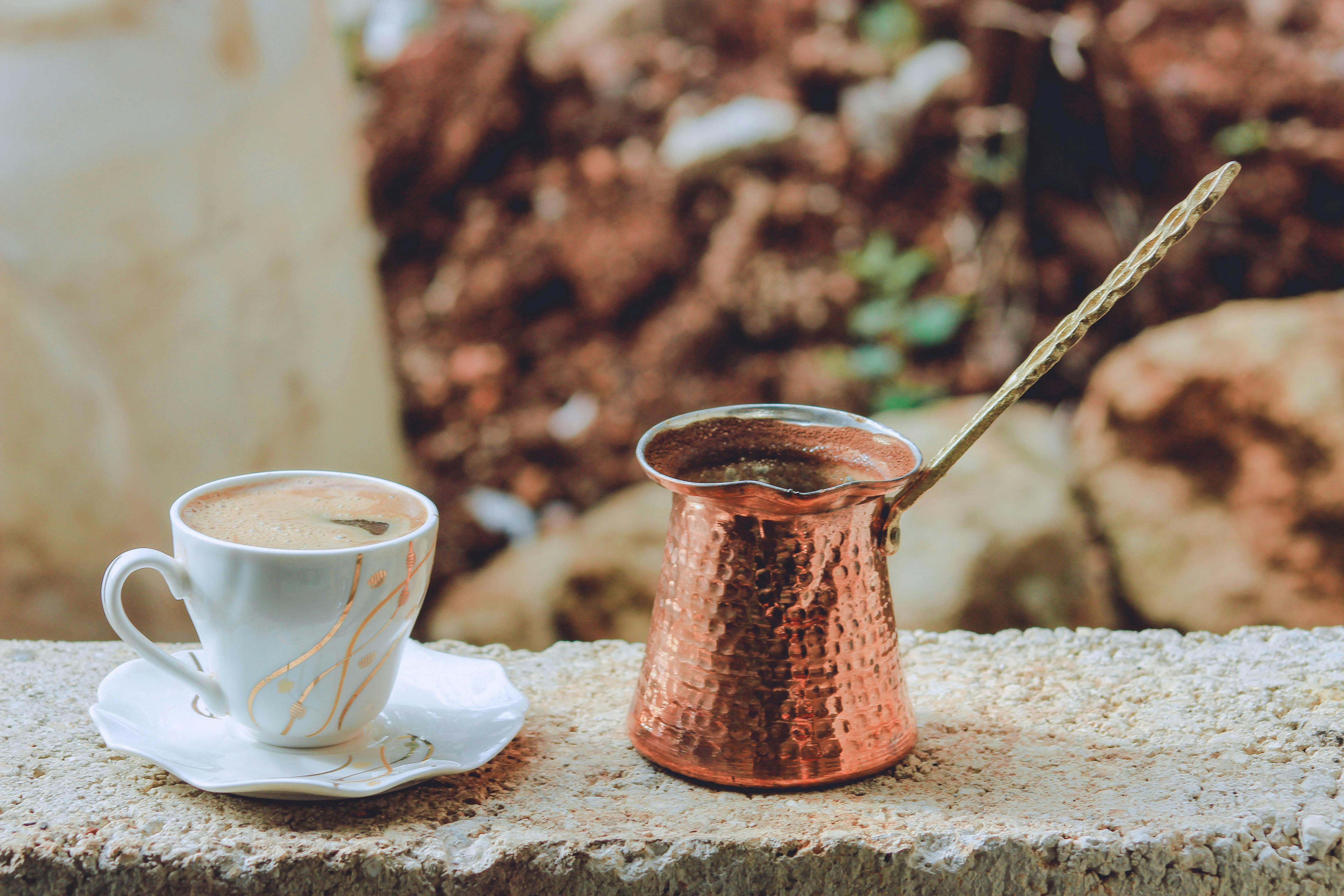 White ceramic mug on brown wooden coaster photo – Free Coffee cup Image on  Unsplash
