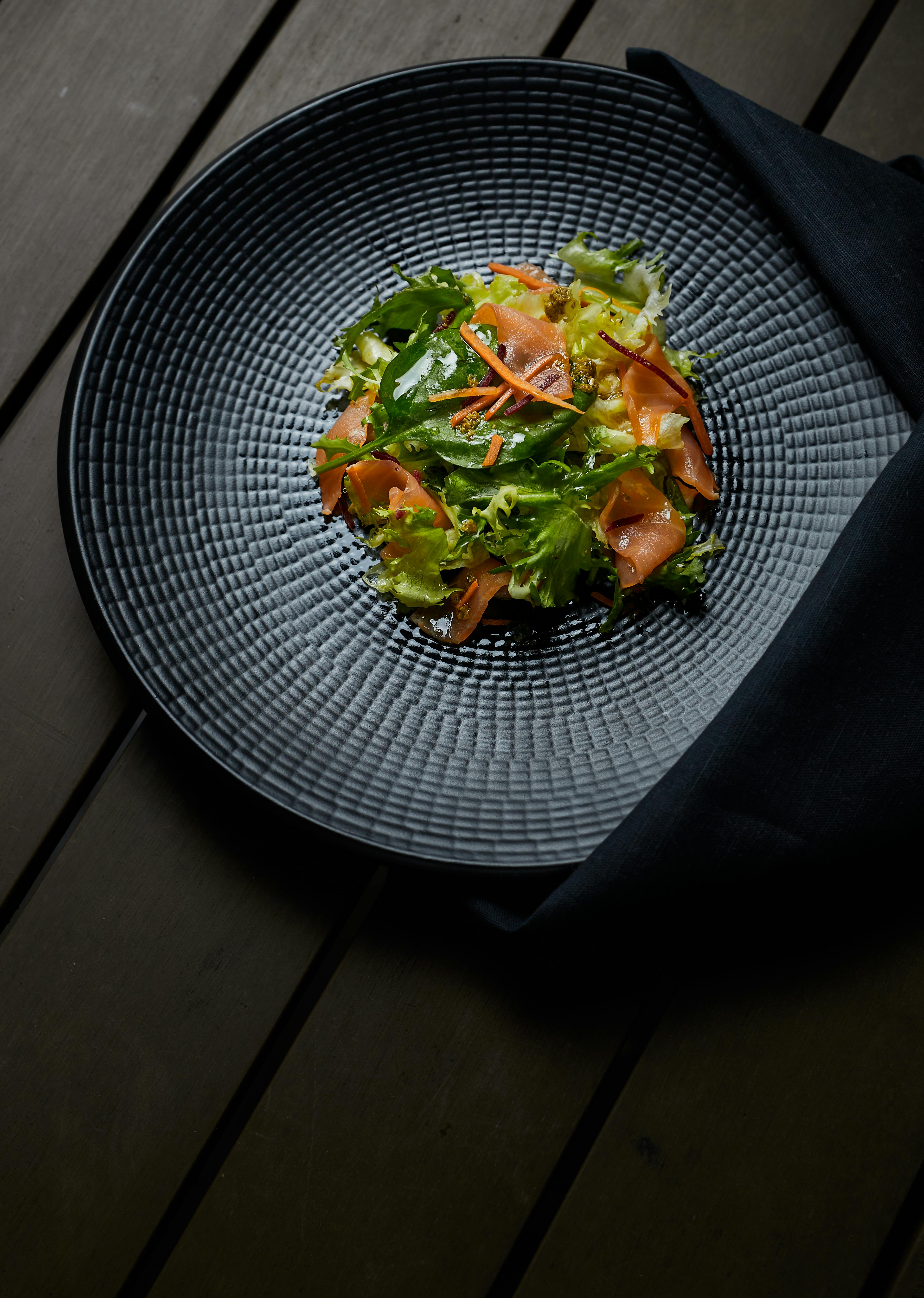 veggies dish on gray and black plate