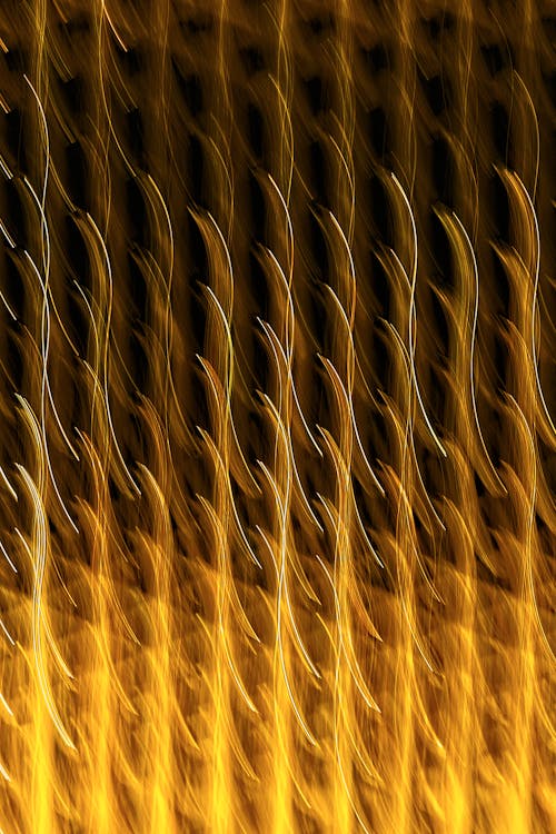 A close up of a yellow and black abstract background