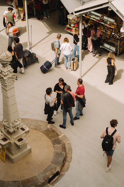 People are walking around in an airport