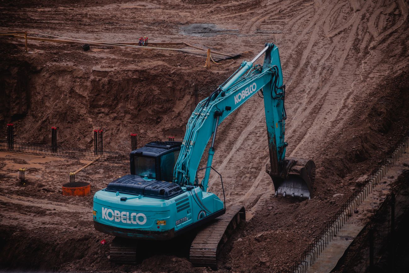 Excavator digging at a job site