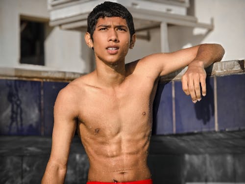 Free Shirtless Boy in Pool Stock Photo