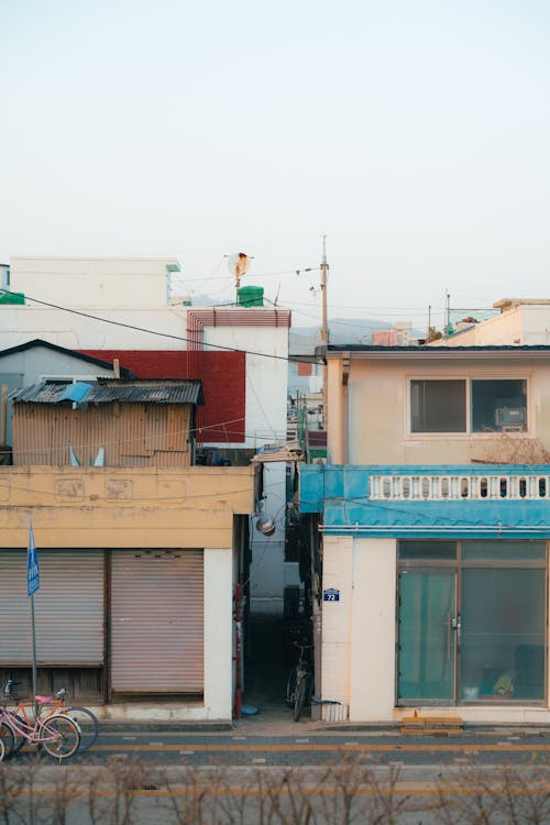 A view of a street with buildings and a bike