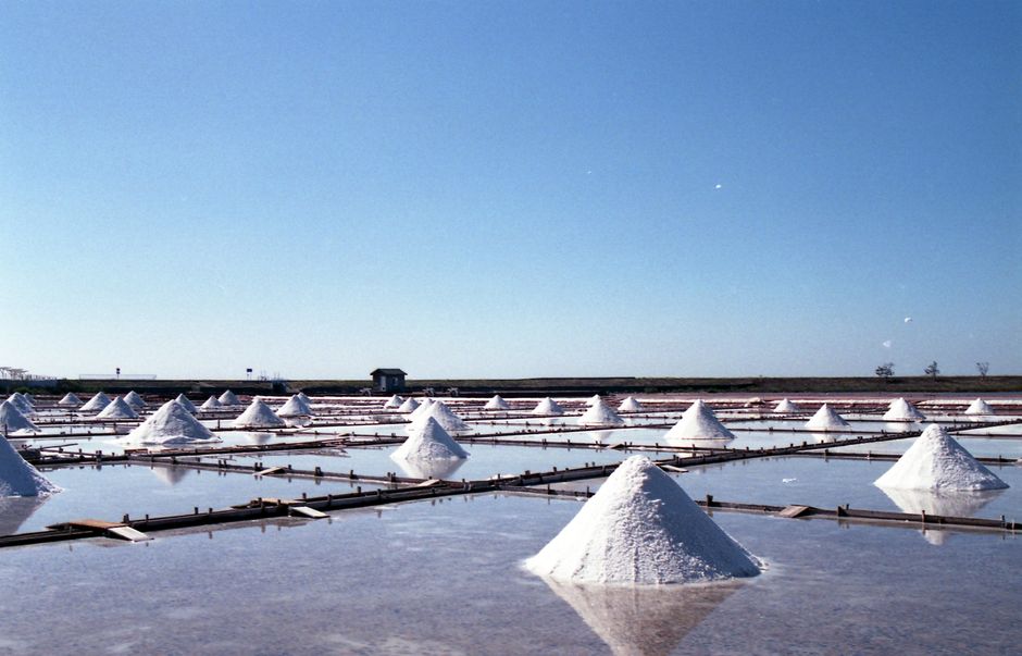 A breathtaking view of traditional salt fields and reflections in Tainan, Taiwan.