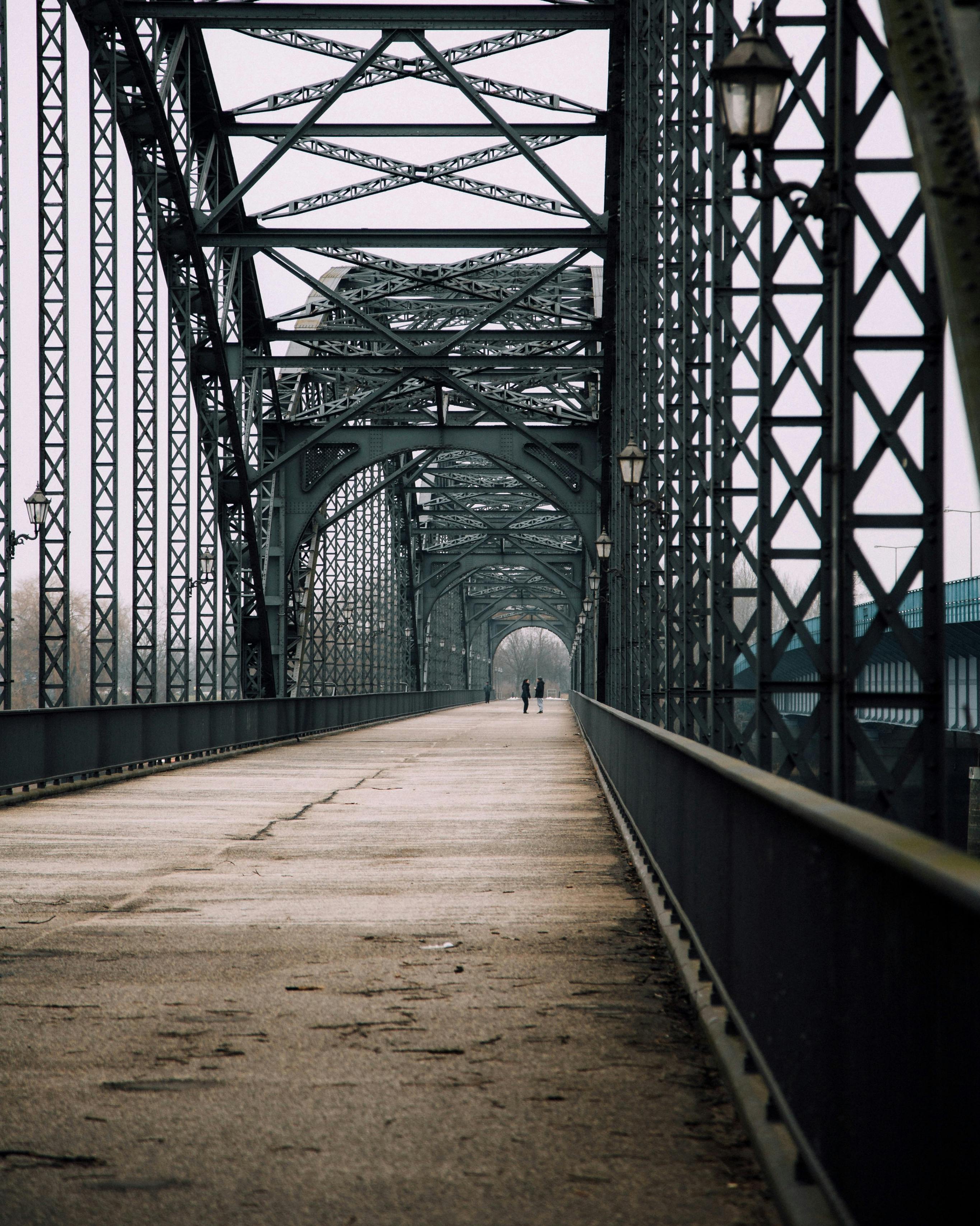 Dramatic view of the 19th-century steel arch bridge in Hamburg, Germany.