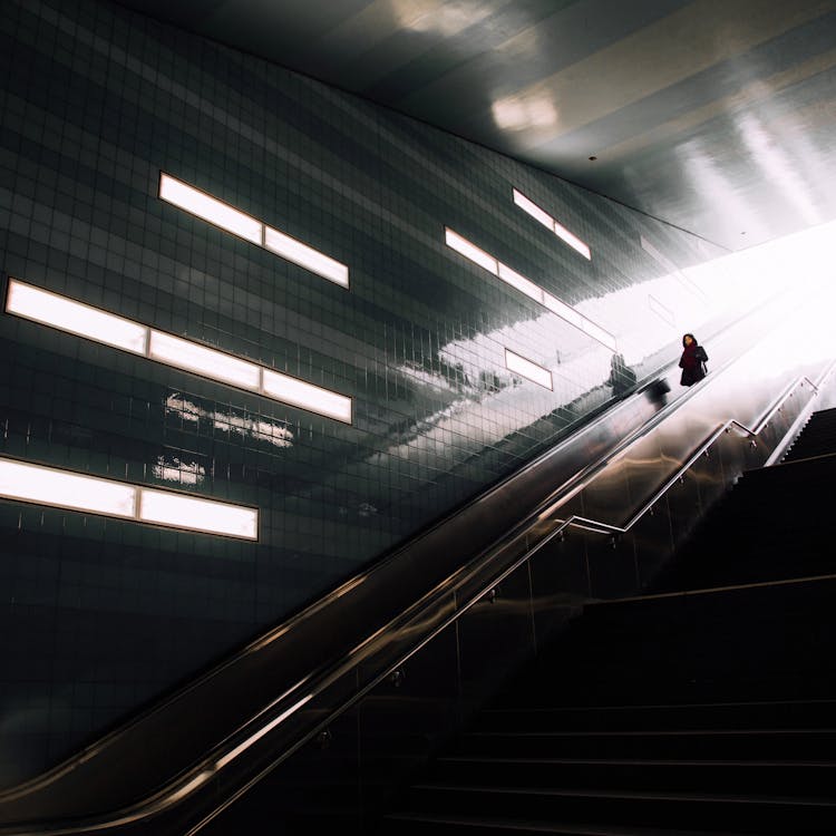 Passerby On The Escalator Of The Hamburg Subway Station