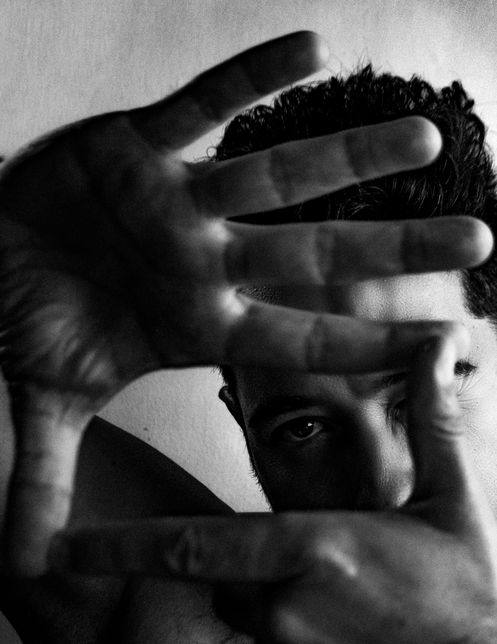 Portrait of a Young Man Showing a Hand Gesture in Black and White ...