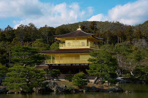 A golden building sits on top of a hill