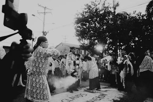 A black and white photo of a group of people