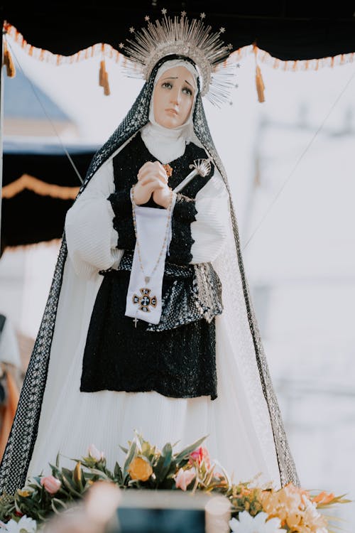 A statue of the virgin of guadalupe is shown