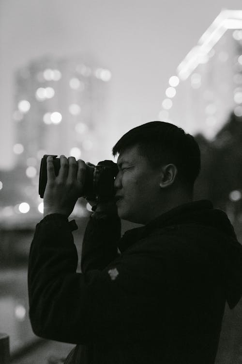 Ilmainen kuvapankkikuva tunnisteilla aasialainen mies, kamera, lyhyet hiukset