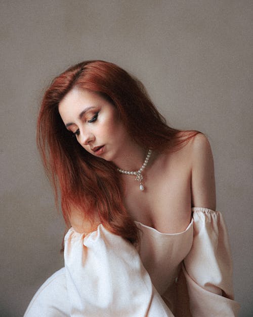 Woman with Dyed Hair and in White Dress