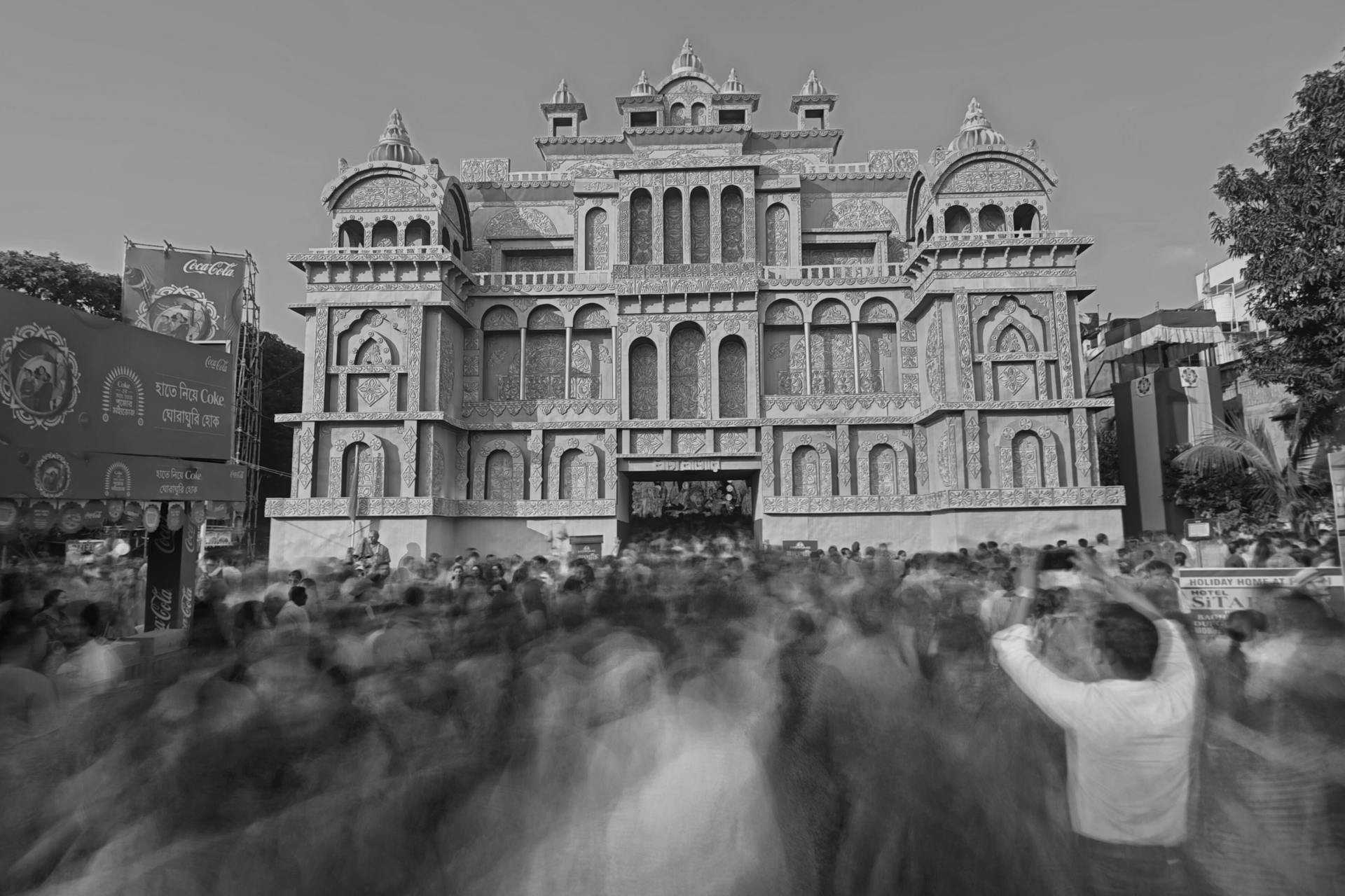 Crowd gathers at a grand Durga Puja pandal in Kolkata, India.