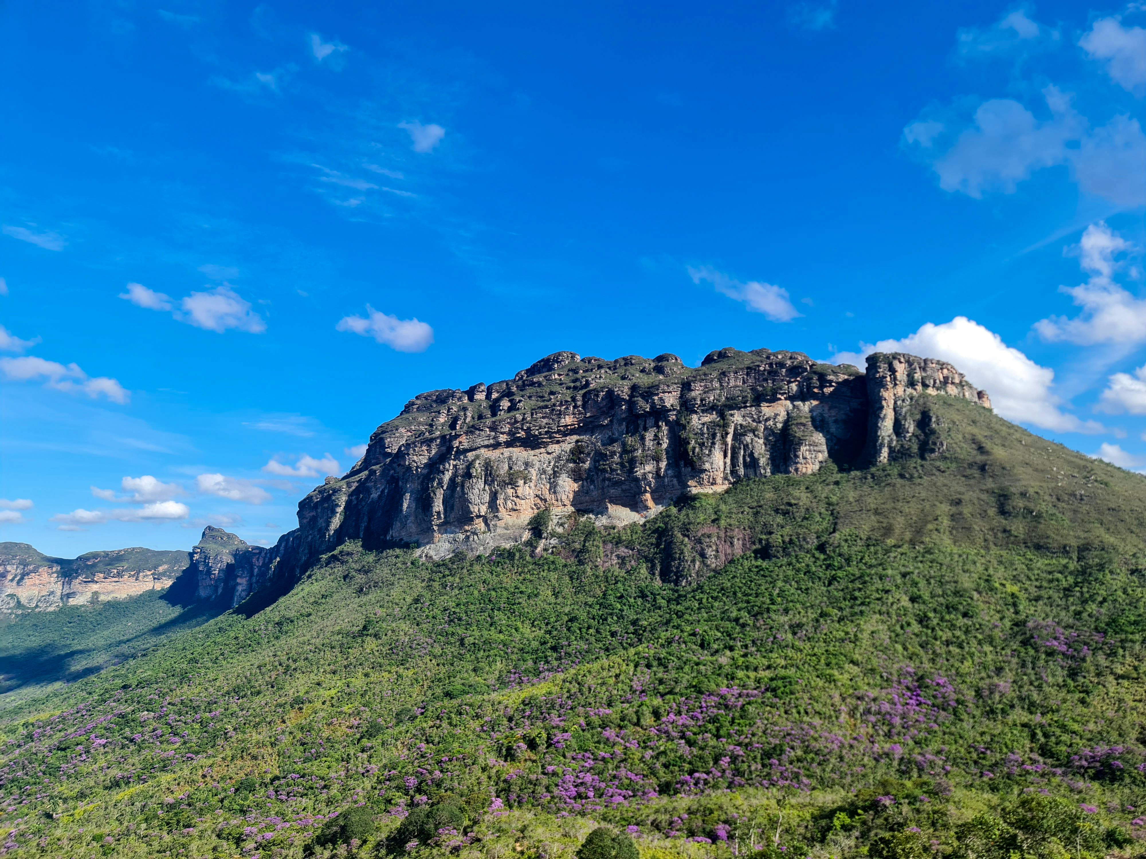 Stunning mountain landscape in Chapada Diamantina, Palmeiras, Brazil, under a vibrant blue sky.
